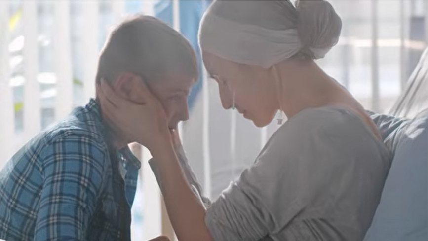 A mother embraces her son in the hospital.