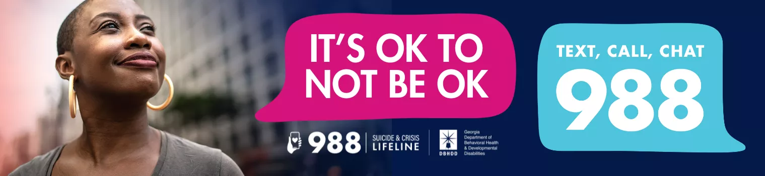 Dial 988. It's ok to not be ok. A lady looks up with a smile. 