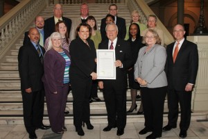 Staff from the Georgia Department of Administrative Services' Purchasing Division visit Gov. Nathan Deal to celebrate Purchasing Month in Georgia.